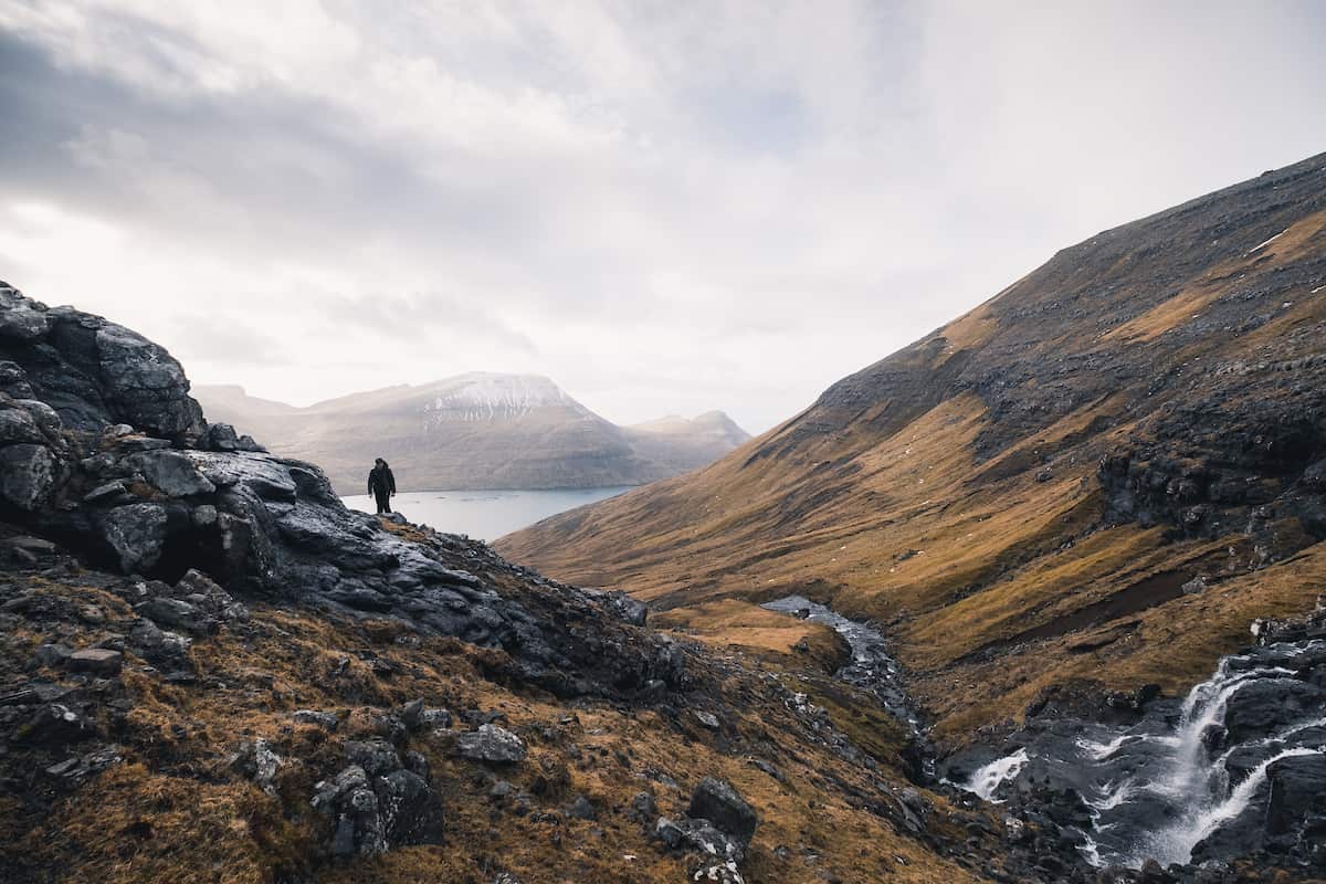 Faroe Islands with dramatic cliffs winding fjords and remote villages showcasing the untouched natural beauty of the archipelago