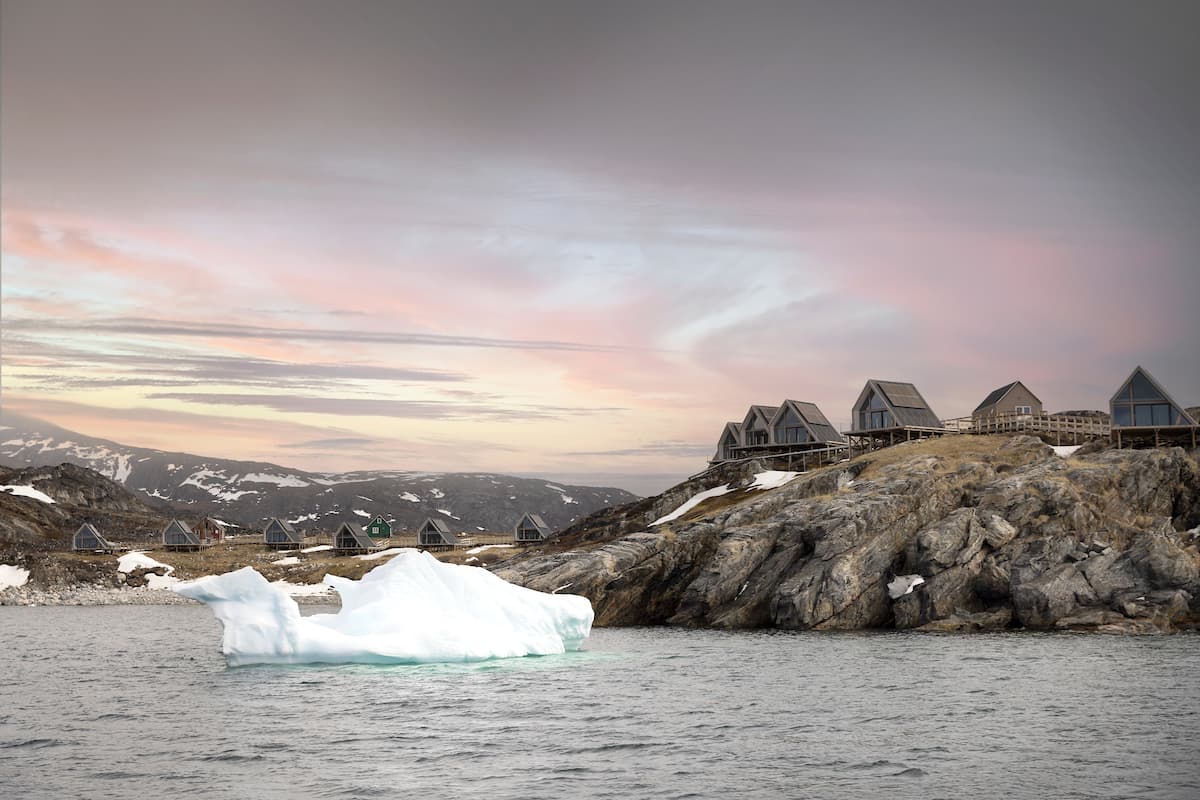 Modern wooden lodges overlooking the sea in Ilimanaq Greenland blending comfort with remote Arctic surroundings