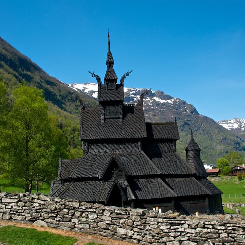 Borgund Stave Church in Borgund in Lærdal, Norway, featuring medieval wooden architecture and rich cultural heritage in a scenic valley setting