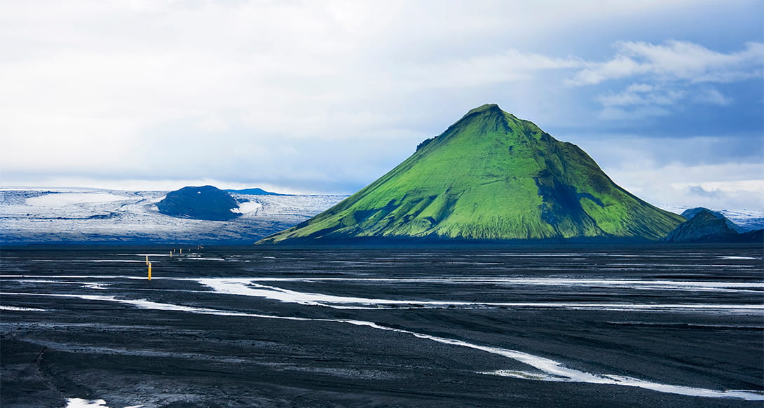 Mountain river and glacier in remote Fjallabak Highlands Iceland with dramatic terrain and untouched nature in the heart of the interior