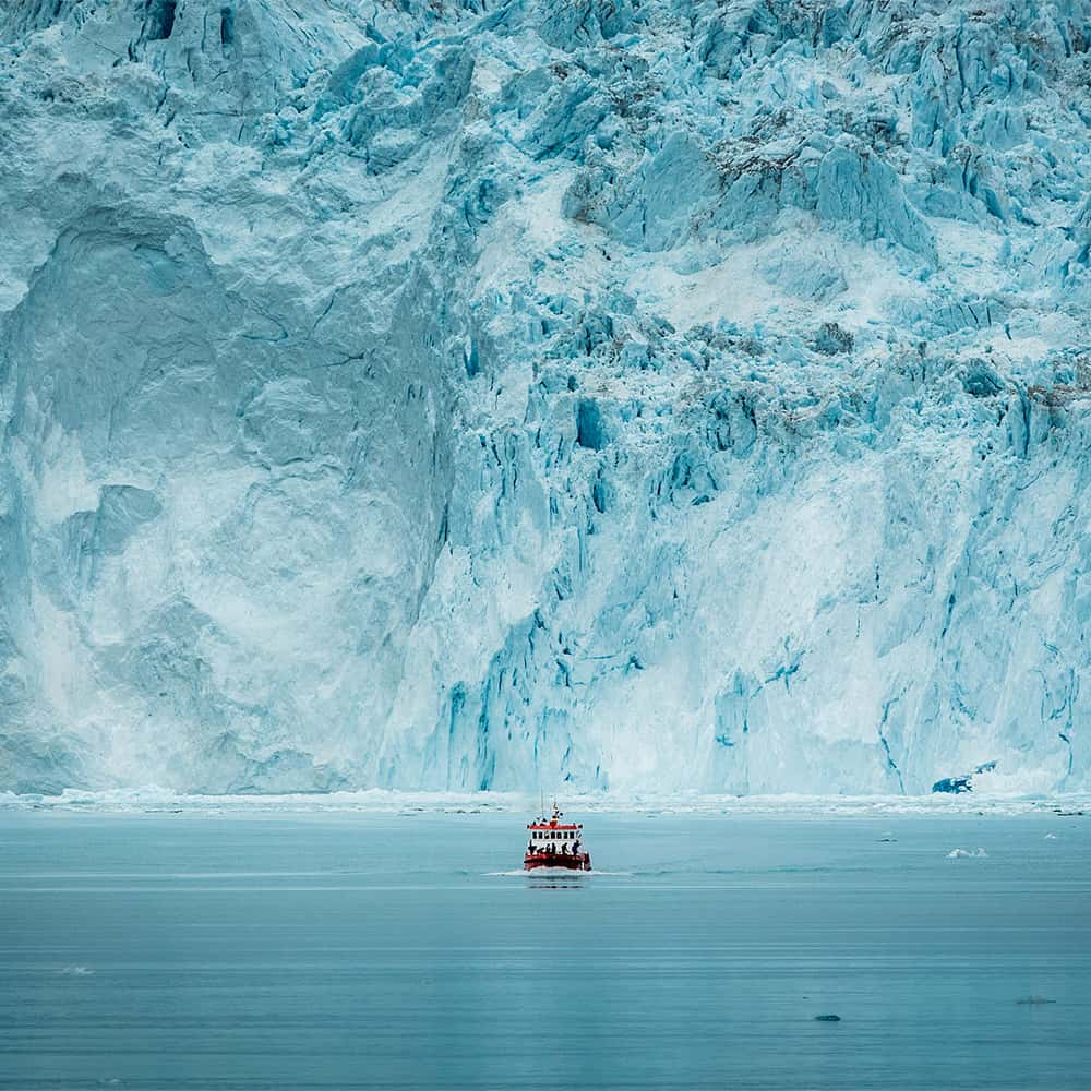 Huge glacier wall at the Eqi glacier in Greenland