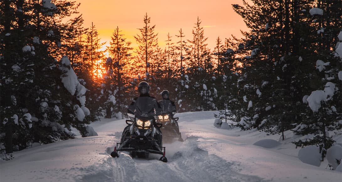 Snowmobile in Finnish nature