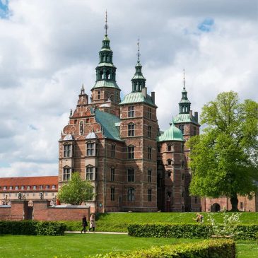 Rosenborg Palace in Copenhagen Denmark with its ornate Renaissance architecture and manicured gardens in a peaceful city park setting
